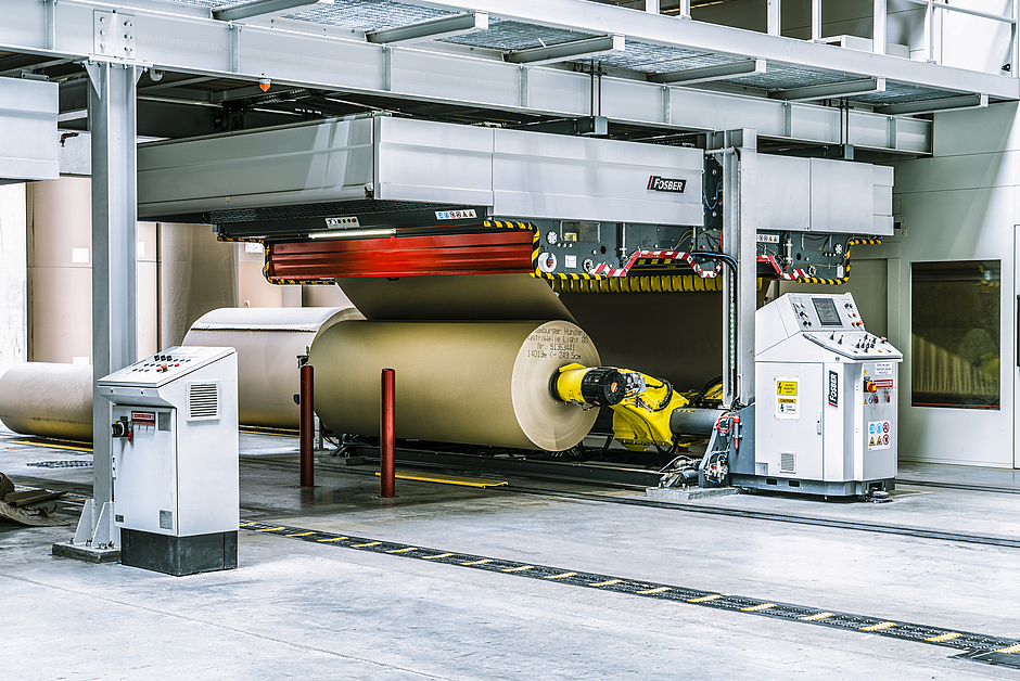 Base papers are mounted on reel stands